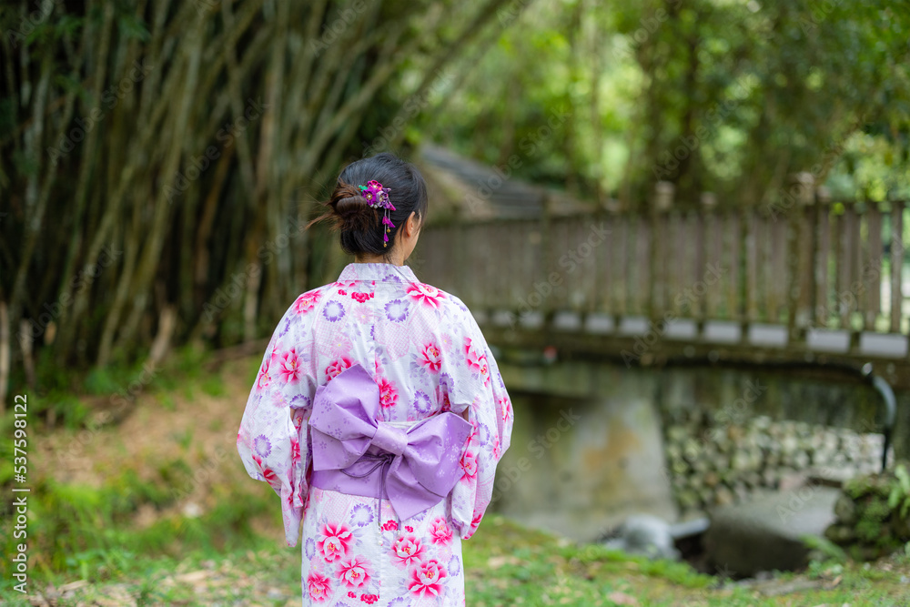 Asian woman with Japanese yukata in countryside Asian woman with Japanese yukata in countryside