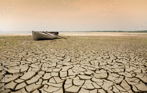 Fototapeta Naklejka Na Ścianę i Meble -  Rowing boat on dried lake