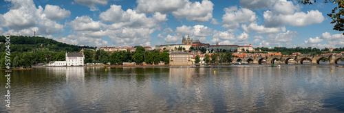 At the gate of Charles Bridge Prague Castle and river Vltava Prague Czech Republic.