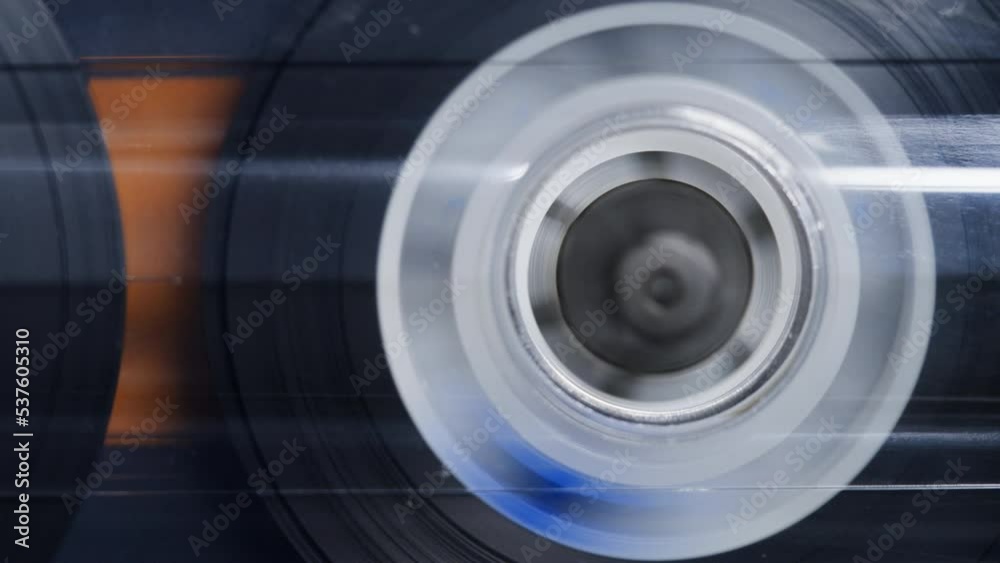Retro radio tape recorder, audio cassette close-up. Listening to music, old radio boombox player, searching channel. Retro radio tape recorder, audio cassette close-up. Listening to music, old radio boombox player, searching channel.