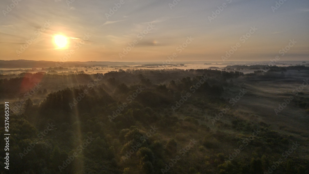 Obraz premium Sunrise near City with fog