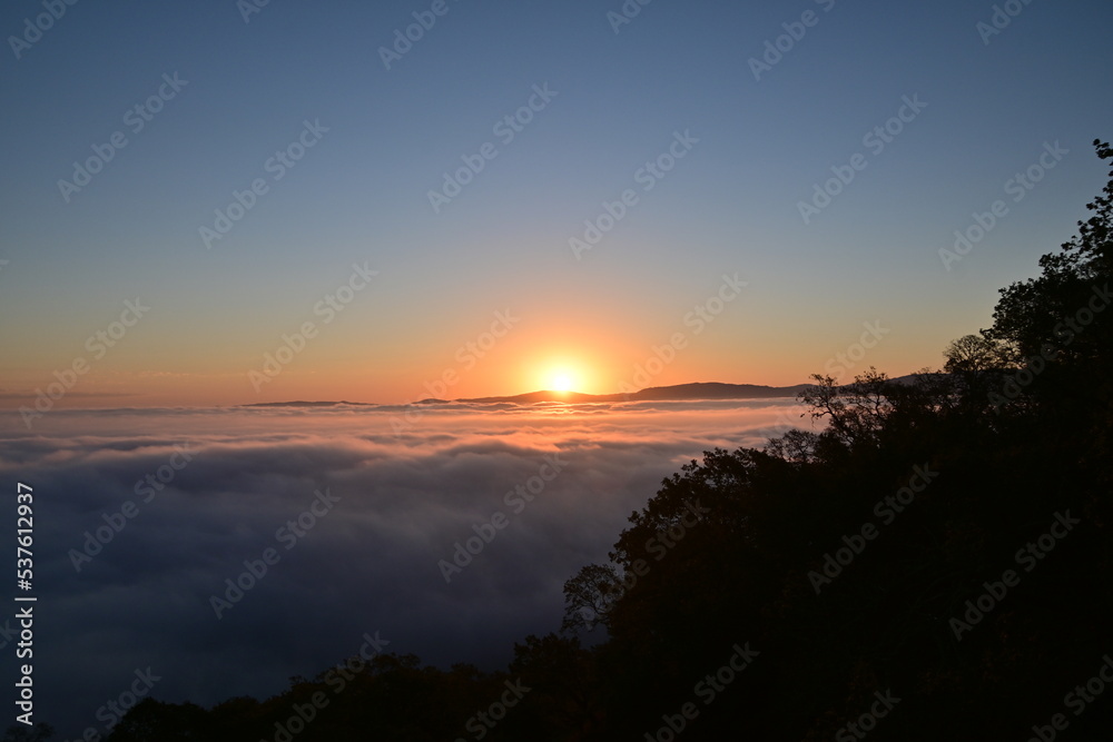sunset over the clouds sunset over the clouds