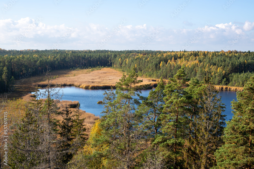 Autumn scenery with the lake from Kangari view tower in October on a sunny day in Latvia Autumn scenery with the lake from Kangari view tower in October on a sunny day in Latvia