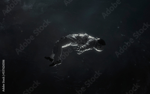 Fototapeta Naklejka Na Ścianę i Meble -  3D illustration of astronaut falling in deep space. 5K realistic science fiction art. Elements of image provided by Nasa