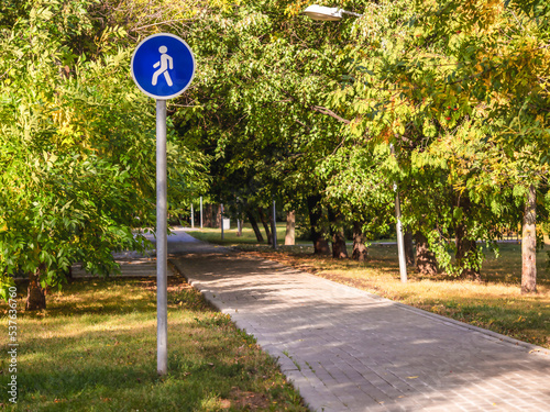 The path in the park, the sign of the walkway.