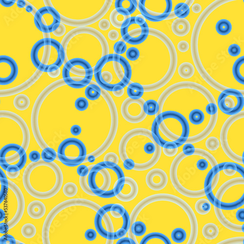 Geometric abstract seamless pattern of random arranged azure rings with dots texture on yellow background.Round shapes halftone point wallpaper.For stationery covers,trendy textile,fashionable fabrics