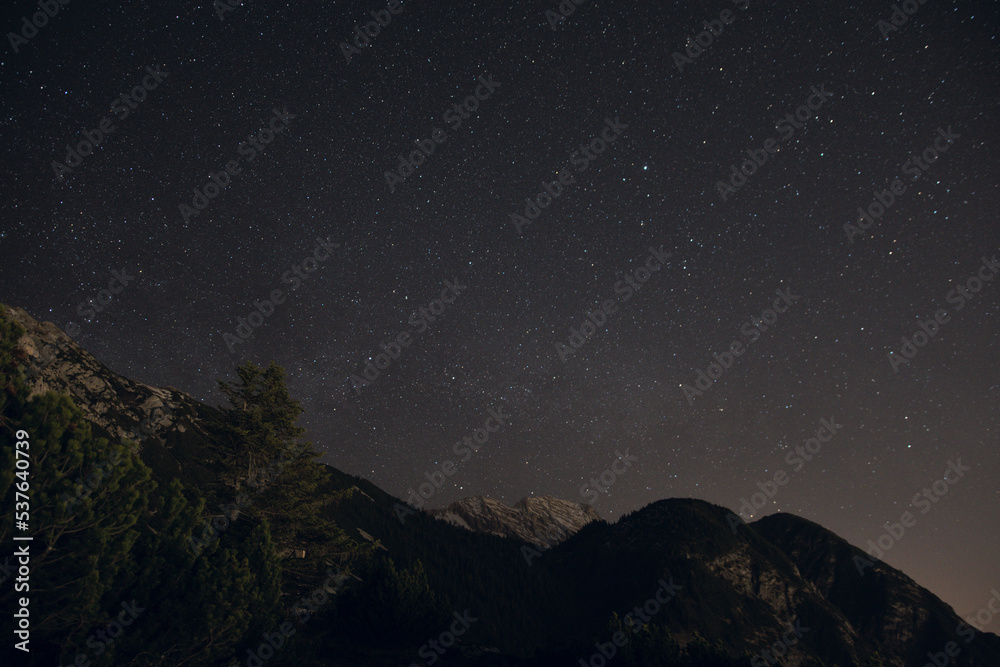Night sky with Lyra constellation above the Tyrolian Karwendel Alps (Bettelwurf) near Innsbruck, Tyrol, Austria