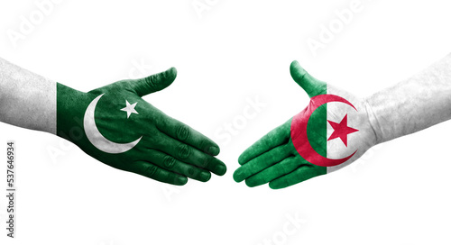 Handshake between Algeria and Pakistan flags painted on hands, isolated transparent image.