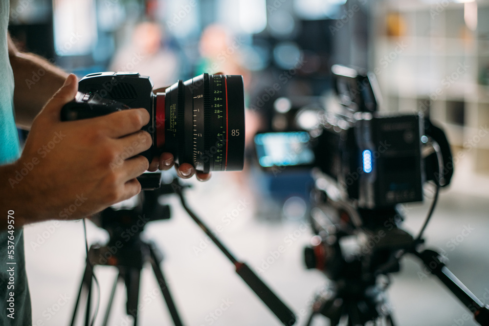 Professional cinema and video camera on the set. Shooting shift