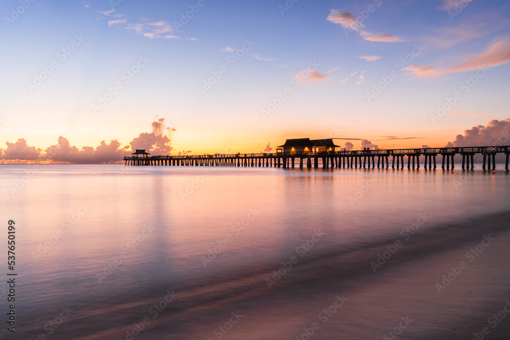 Naples Florida colorful sunset over the Naples beach pier South West Florida summer