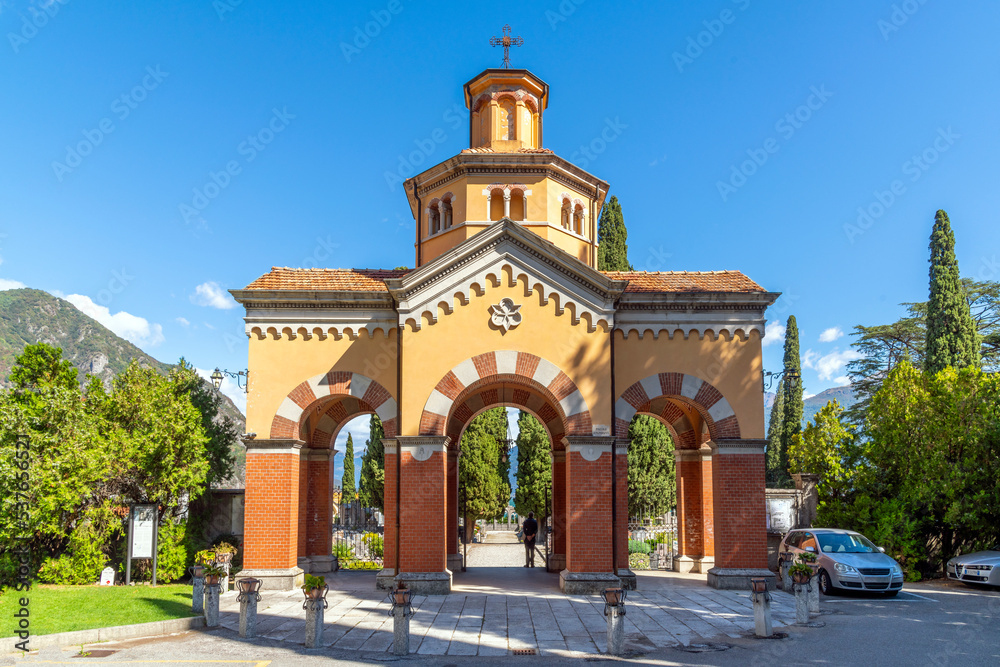 The ornate entrance to the cemetery overlooking Lake Como in the Italian resort village of Menaggio, Italy. The ornate entrance to the cemetery overlooking Lake Como in the Italian resort village of Menaggio, Italy.