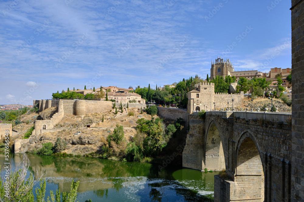 San Martin's Bridge in Toledo, Spain, a scenic 14th-century pedestrian bridge offering sweeping views of the Tagus River.