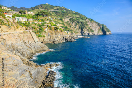 Monterosso al mare idyllic beach, Cinque Terre cliffs, Liguria, Italy