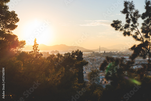 Piraeus city, Attica, beautiful panoramic view of Piraeus, Greece, with harbour and port, mountains and scenery beyond the city, seen from Prophet Helias Hill on Kastela Hill, sunset summer view photo