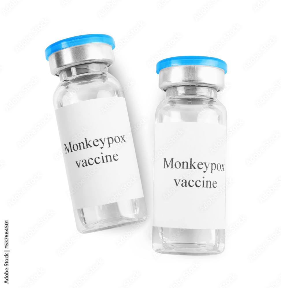 Monkeypox vaccine in glass vials on white background, top view Monkeypox vaccine in glass vials on white background, top view