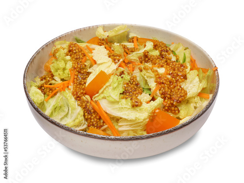 Delicious salad with Chinese cabbage and mustard seed dressing isolated on white