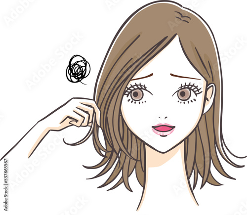 ヘアスタイルの乱れや髪の傷みやパサつきなどのトラブルに悩み困った顔をする女性
