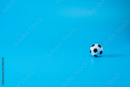 Plastic Toy Football Isolated On Blue Background