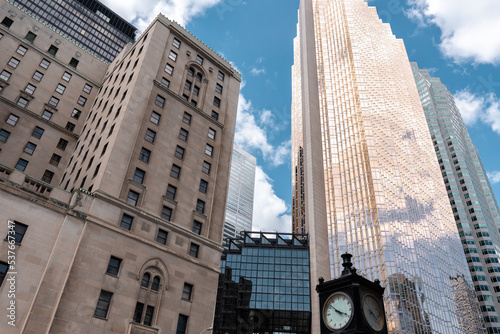 Toronto, Canada - May 28 2022: Skyscraper covered in golden glass in Toronto, Canada. Royal Bank Plaza building serving as a headquarter photo