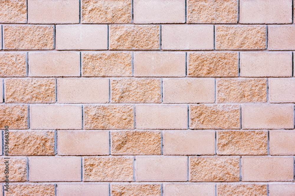 Naklejka premium Stone fence background by the house.