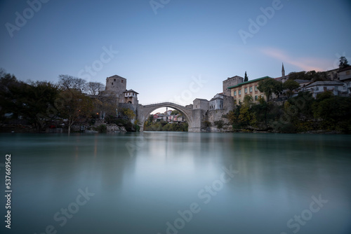 Mostar bridge touristical destination unesco worid heritage with blue sky and lights