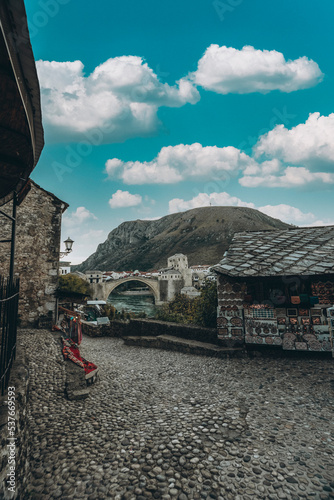 Mostar bridge touristical destination unesco worid heritage with blue sky and lights photo