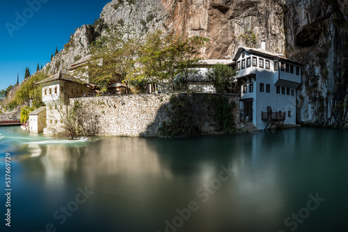 Touristic destination, blagaj tekija with beautiful scenery view and waterfall and water comes from mountain