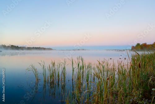 Picturesque Williamstown lake at misty dawn Lakeville New Brunswick Canada