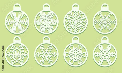 Christmas balls with Snowflakes laser cutting. Set cut out of paper. Sample Templates. Xmas tree decoration for party laser or plotter cut printing serigraphy or wood carving Vector illustration