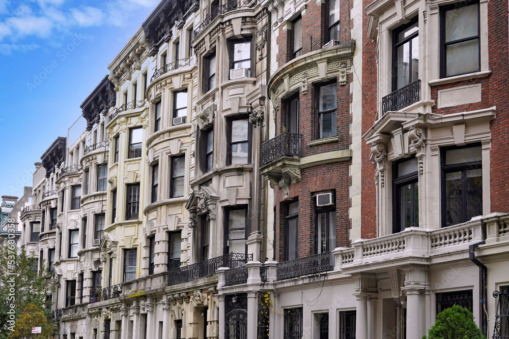 New York, row of elegant bow fronted townhouses near Central Park West