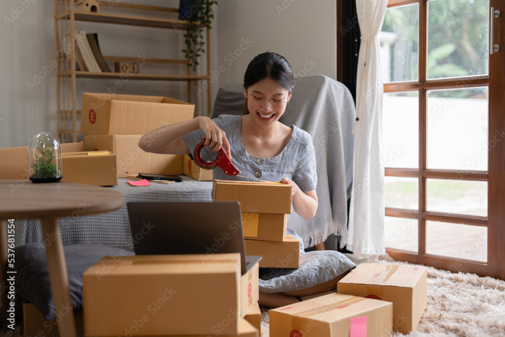 Asian small business owner working at home office. Business retail market and online sell marketing delivery, SME e-commerce concept Asian small business owner working at home office. Business retail market and online sell marketing delivery, SME e-commerce concept