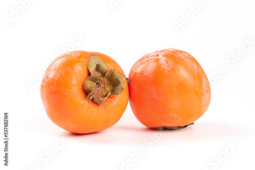 Ripe persimmon fruit isolated on white background..Close up of fresh kaki photo