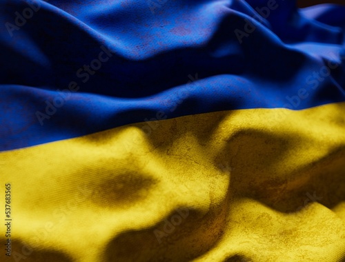 Worn Ukrainian flag waving in the wind