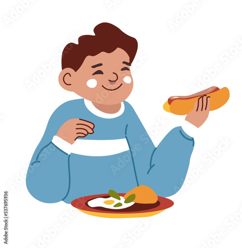 Kid eating hotdog and omelet at home or school