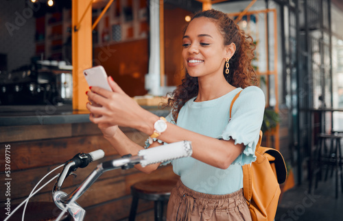 Bicycle  smartphone and black woman in city using phone for social media  carbon footprint and outdoor online communication. Student  travel bike and 5g cellphone internet search for urban wellness