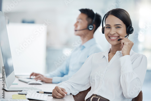 Telemarketing, sales or woman customer service consultant talking on headset. Job, crm or call center worker consulting an call for customer support. Portrait with contact us on our help desk line photo