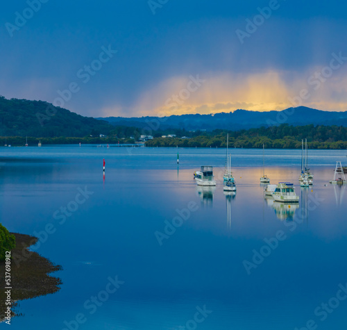 Early morning storm light and reflections at the waterfront