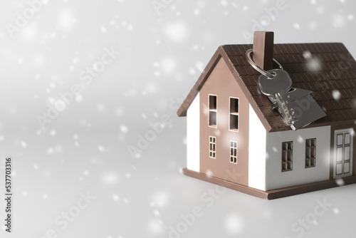 Model of house and key on g...