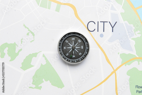 Vintage compass on city map
