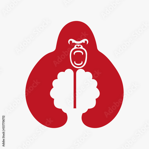 Gorilla Brain Logo Negative Space Concept Vector Template. Gorilla Holding Brain Symbol
