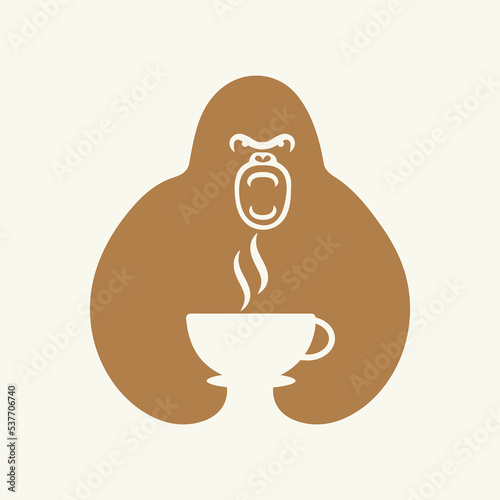 Gorilla Tea Cup Logo Negative Space Concept Vector Template. Gorilla Holding Tea Cup Symbol photo