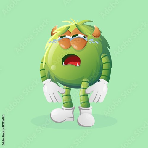 Cute green monster crying