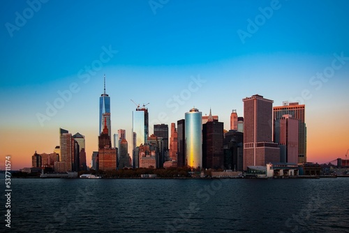 New York city skysrapers, beautiful cityscape captured at sunset photo