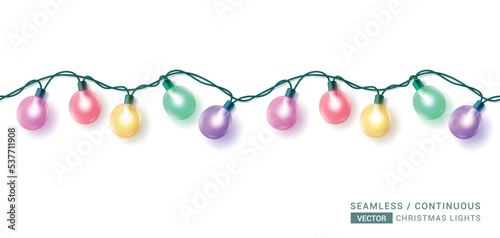 Christmas seamless lights vector design. Seamless xmas light with colorful endless garland decoration in white background. Vector Illustration.