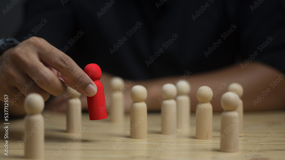 Leader sgip, HR, HRM, HRD concepts. HR manager hand or Employer chooses takes in hand employee. Leader stands out from crowd. Looking for good worker. Leader sgip, HR, HRM, HRD concepts. HR manager hand or Employer chooses takes in hand employee. Leader stands out from crowd. Looking for good worker.