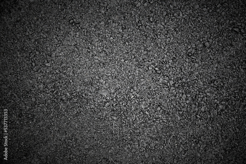 black sandpaper texture background.
