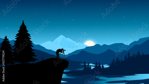 Landscape of a beautiful starry night and a photographer capturing its beauty. 
