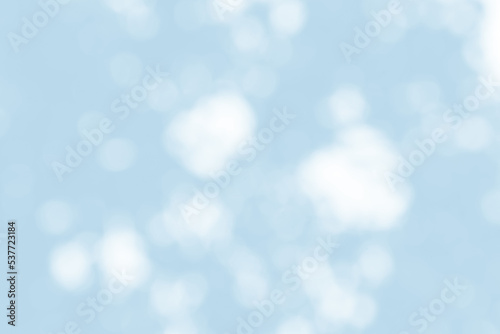 Abstract light blue blur bokeh for background, light blur on high light blue gradient abstract background in central design for presentation.