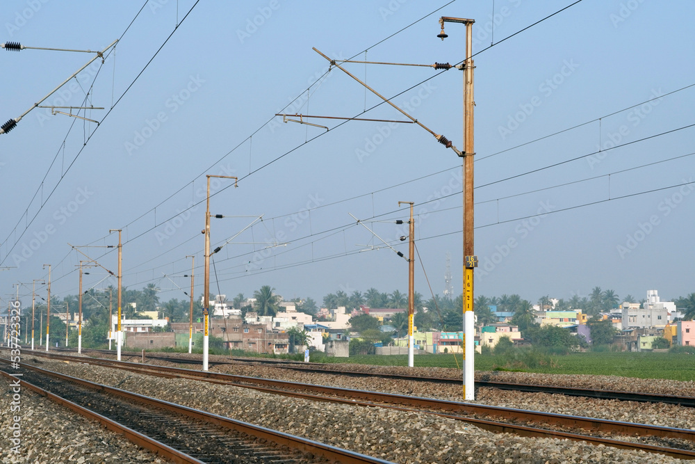 Railway in the fog. Indian railway track in winter season. Foggy winter morning. Mist in the train tracks.