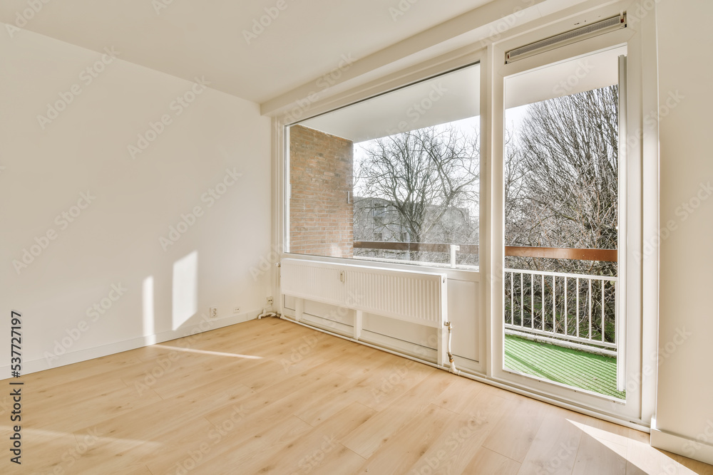 Empty room with door leading to terrace Empty room with door leading to terrace